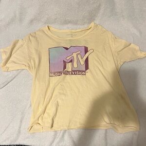 Soft yellow MTV t shirt
Size S 
Great condition